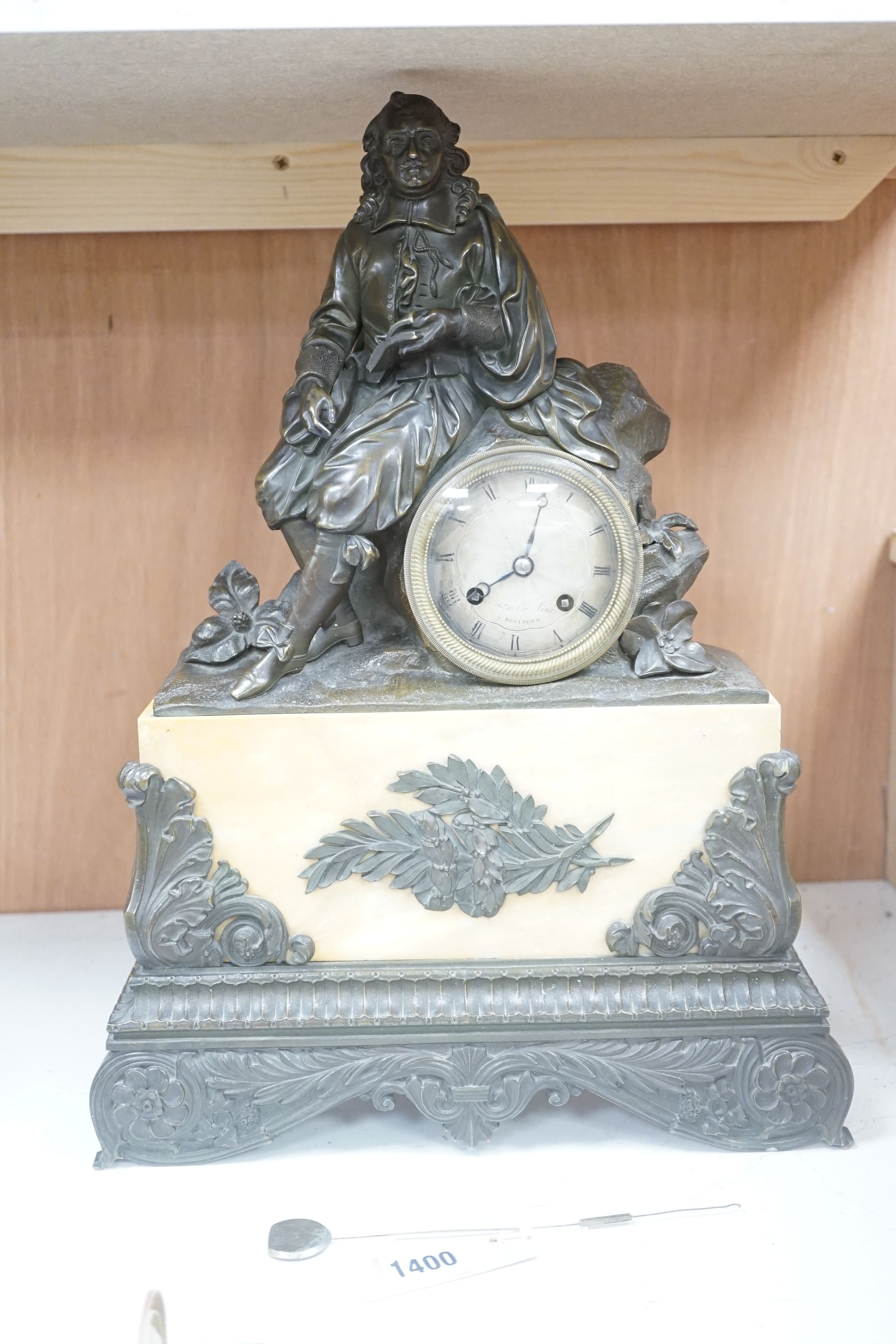 A 19th century French mantel clock, bronze scholar surmount, signed Bataille Aine, Besancon, 44cms high.